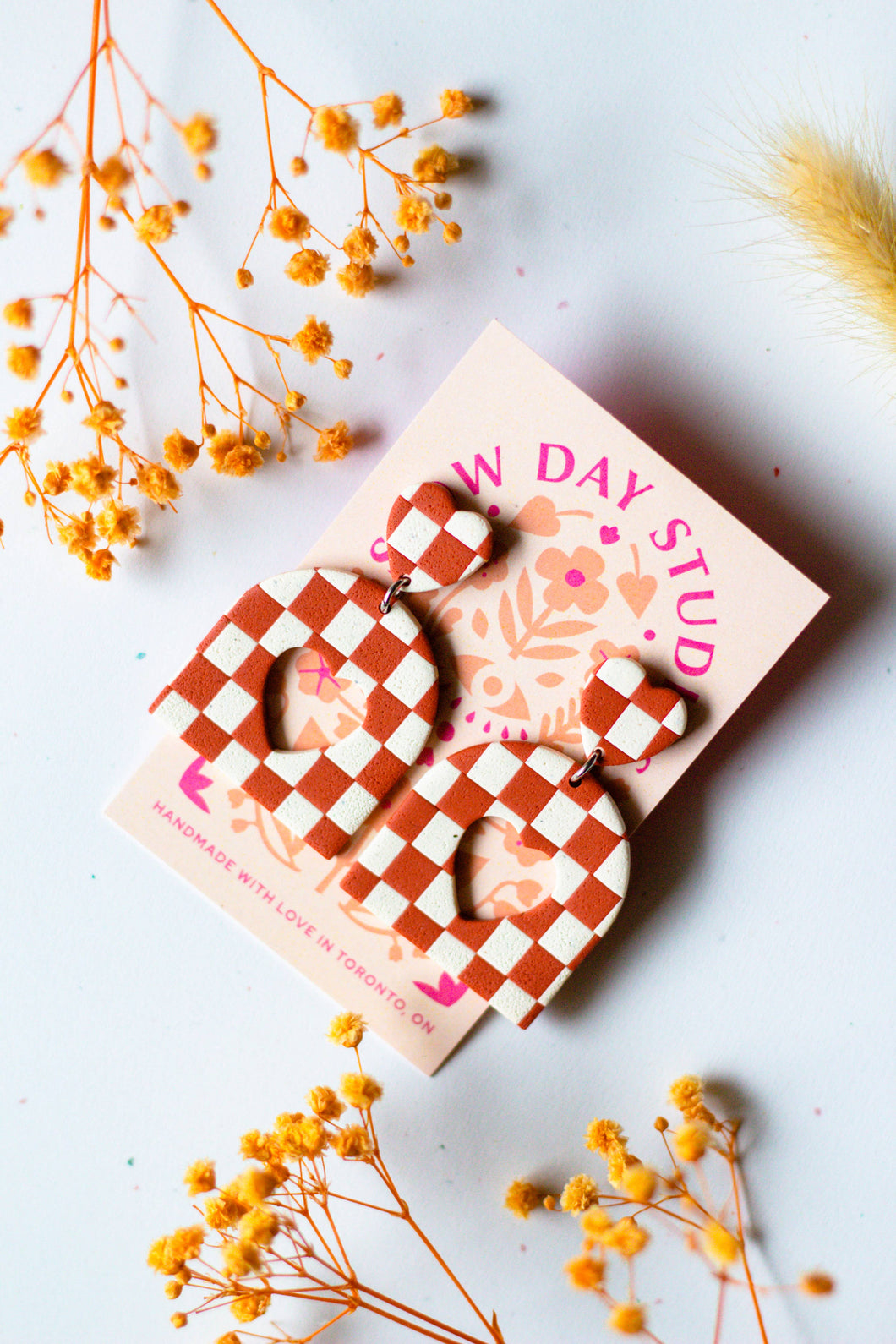 Checkerboard Heart Cutout Dangle - Rust & Cream